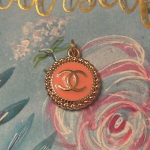 CHANEL Pink and Gold Logo charm